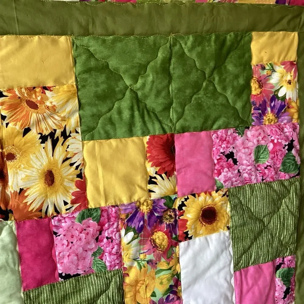 NWT. Hand Crafted Field of Flowers  Quilt with Green, Yellow and Pink Accents